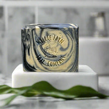 Load image into Gallery viewer, soap bar with blue white black colors on top of a soap dish