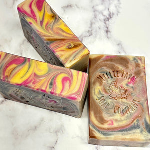 3 soap bars colored with magenta, gold, white and brown