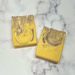 yellow soap bar with brown and white color swirls