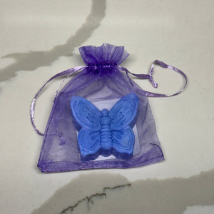 blue butterfly shaped soap in a purple organza bag