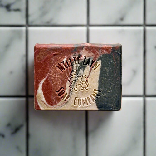 bar soap colored in red cream and black